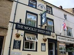 Woolly Sheep Inn logo